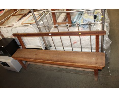 A stripped pine bench