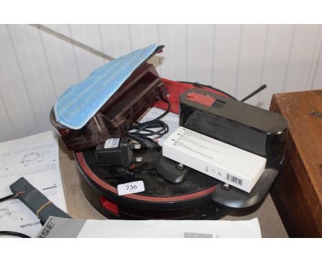 A Lefant Combi robot vacuum and floor cleaner with charging dock and various boxed as new accessories, sold as seen