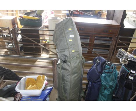 A green Bivvy in bag two man fishing tent