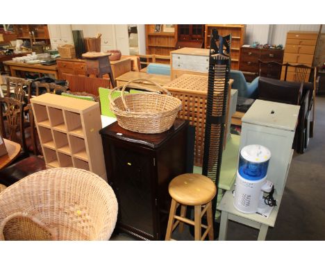 A floor standing CD rack, a wicker twin handled basket, a modern pine stool, a stereo cabinet and a set of shelves 