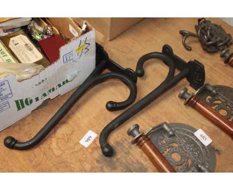A pair of Great Western Railways style iron hat hooks
