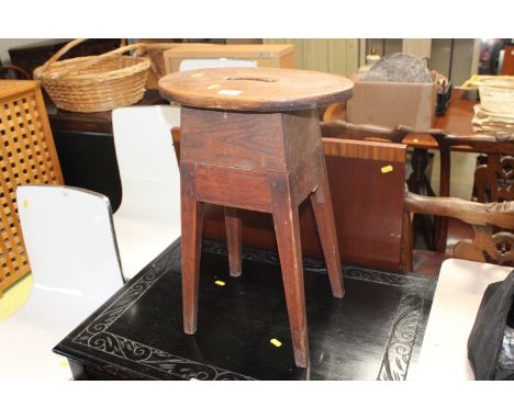 An antique elm and pine stool