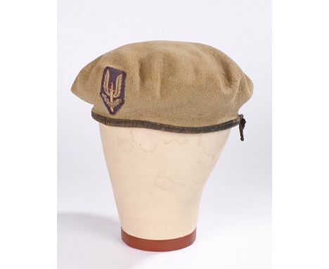 An early Special Air Service Regiment sand coloured beret, the beret is well worn and made from a coarse woollen material, it
