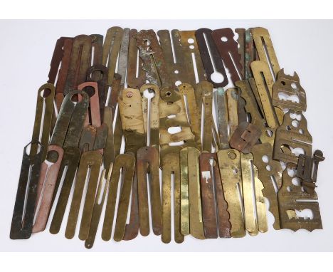 Collection of Victorian, World War I and World War II soldiers button sticks, mainly brass with some bakelite, some stamped, 