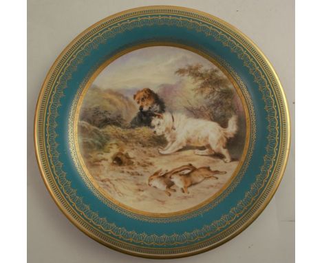 A 19th century Royal Worcester plate, the centre decorated with two terriers and dead game in landscape, to a turquoise and g