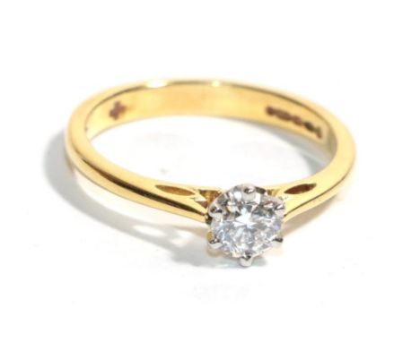 An 18 carat gold solitaire diamond ring, a round brilliant cut diamond in a claw setting, to knife edge shoulders, estimated 