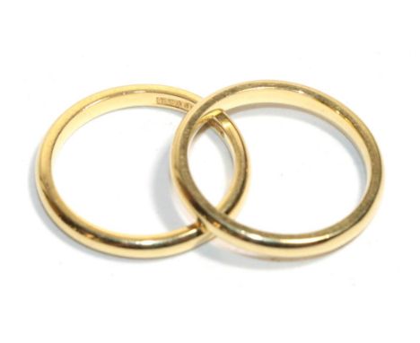 Two 18 carat gold band rings, both finger size I1/2.  Gross weight - 4.57 grams. 