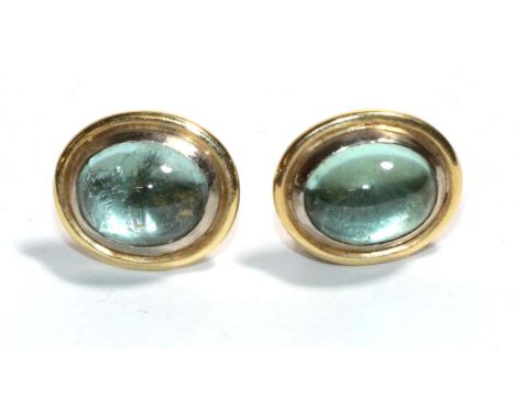 A pair of 18 carat gold aquamarine earrings, with post fittings .  Gross weight - 5.67 grams. 