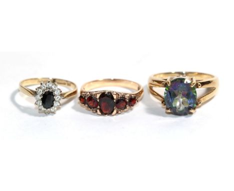 Three various 9 carat gold gem set rings, finger sizes O1/2, P and S1/2.  Gross weight - 11.12 grams. 