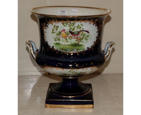 A large twin-handled pottery campana form urn of Worcester style 