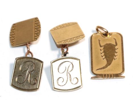 A pair of 9 carat gold cufflinks, engraved with an 'R', chain linked; and a yellow metal pendant, length 2.5cm.  Cufflinks - 