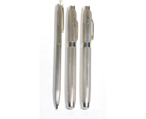 A modern silver fountain pen, ballpoint pen and propelling pencil, marks of BMS, Birmingham 2007 and Harrison Bros &amp; Hows