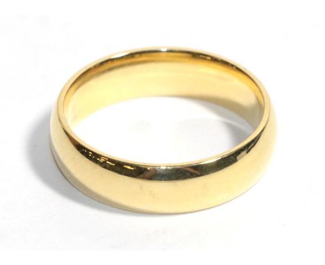 An 18 carat gold band ring, finger size V.  Gross weight - 10.49 grams. 