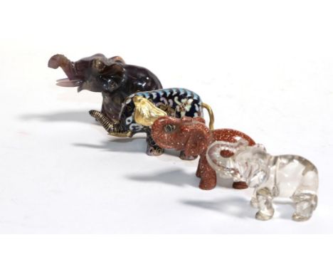 Three Chinese hardstone elephants and a cloisonne enamel Chinese elephant 