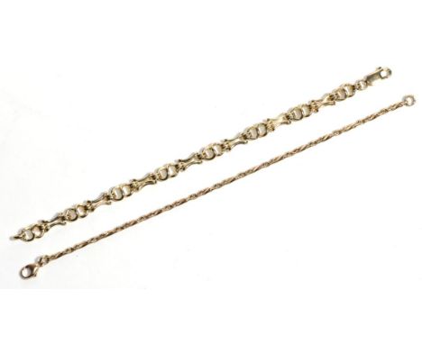 Two 9 carat fancy link gold bracelets, both 19cm long (2).  Gross weight - 16.74 grams.