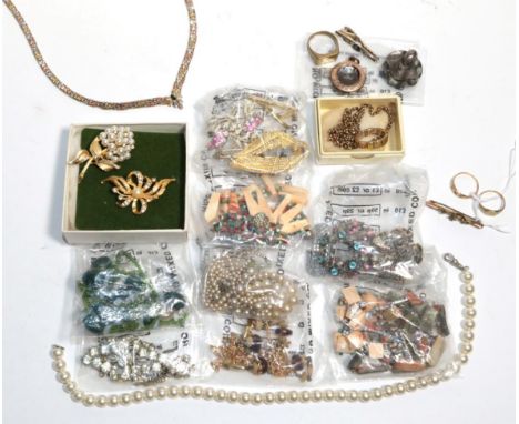 An 18 carat gold ring, stone missing; a 9 carat gold signet ring; a seed pearl bar brooch; and assorted costume jewellery