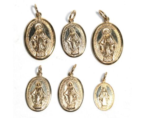 Six 9 carat gold 'Our Lady' charms/pendants, of varying sizes .  Gross weight - 18.85 grams.