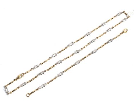 A 9 carat two colour gold fancy link necklace, length 46cm and a matching bracelet, length 18.5cm (2).  Gross weight - 22.13 