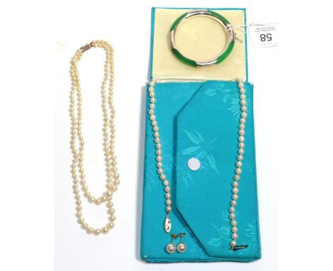 A string of Ciro cultured pearls with a gold clasp stamped '9ct', length 41cm; another string of pearls with clasp stamped '5