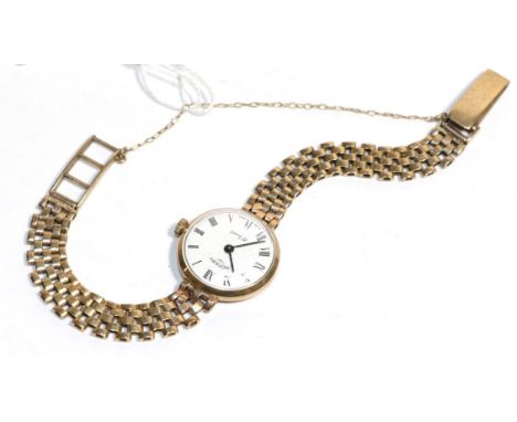 A lady's 9 carat Rotary wristwatch, link bracelet, stamped, Roman enamel circular dial, (a.f.)