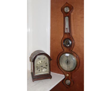 An oak veneered chiming mantel clock and a Victorian mahogany wheel barometer (2)