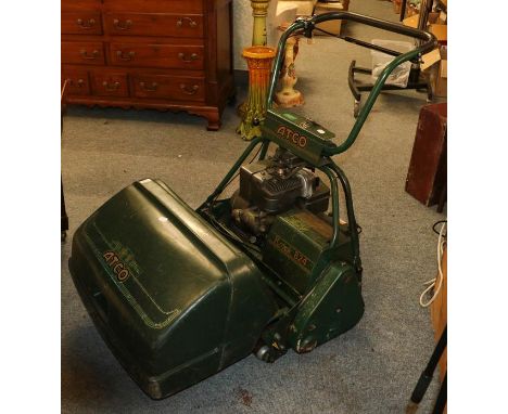 An Atco petrol lawn mower with Briggs &amp; Stratton engine