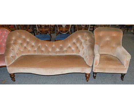 A Victorian double backed buttoned sofa, and a similar chair (2)