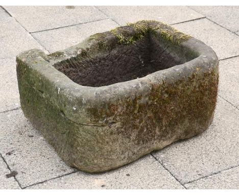 A weathered stone trough, 80cm by 60cm by 40cm .  Loose corner, but does not affect the aesthetics 