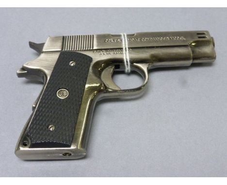 A lighter in the form of a replica Colt's MK IV Revolver