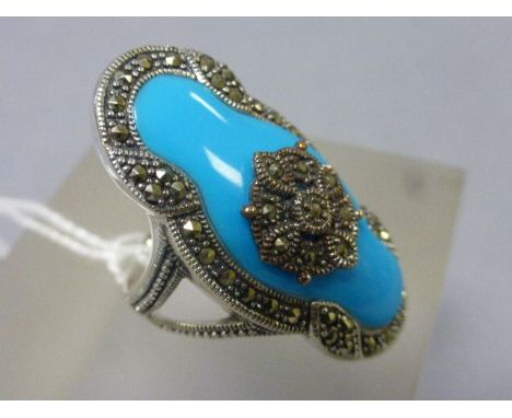 A silver marcasite and turquoise art deco style ring