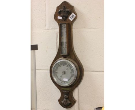 An 1920's oak barometer 
