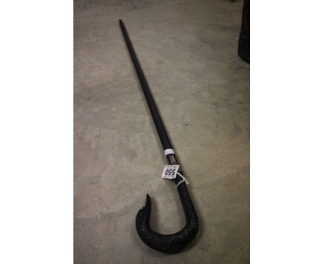 Ebonised walking stick with swan head handle