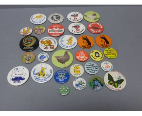 A collection of vintage badges 
