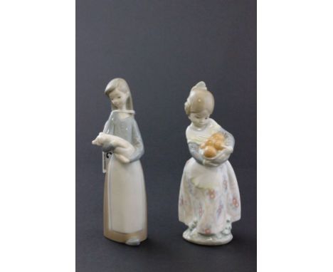 Two Lladro figurines, girl with oranges & girl with piglet