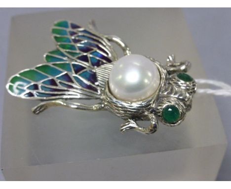 An unusual silver and enamel bug brooch with silver pearl 
