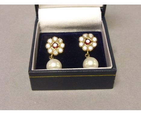 A pair of freshwater pearl drop earrings 