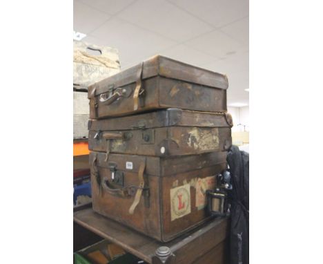 Three Vintage Leather Suitcases, some with luggage labels and containing Edison Reels