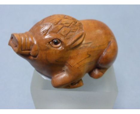 Signed wood netsuke of a Hog