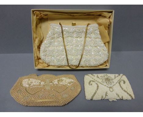 A vintage handbag, along with two purses  