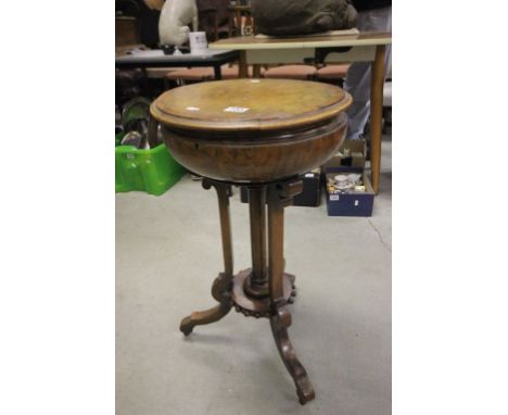 Unusual Victorian Walnut Circular Table, the hinged lid revealing a Tea Caddy Section fitted with two oval lead lined caniste