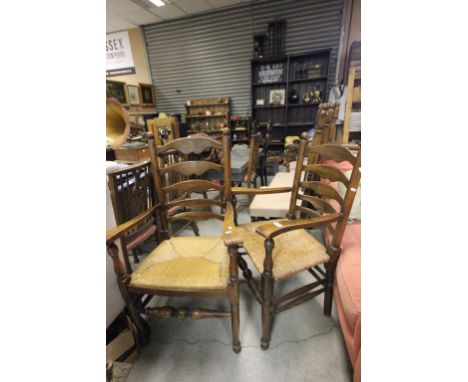 Two Oak Ladder Back Elbow Chairs with String Seats