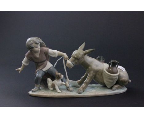 Lladro figurine boy pulling stubborn donkey with puppy, reference G-7M