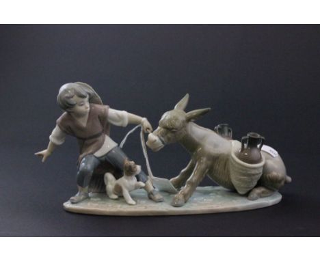 Lladro figurine boy pulling stubborn donkey with puppy, reference G-7M