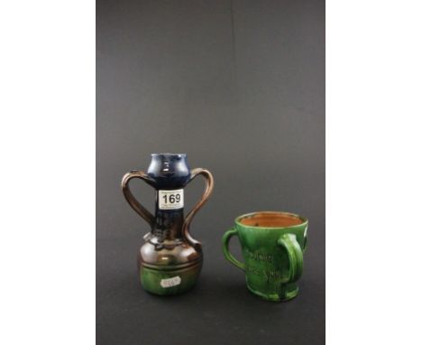 A barum mottoware TYG and an art novveau majolica two handled vase
