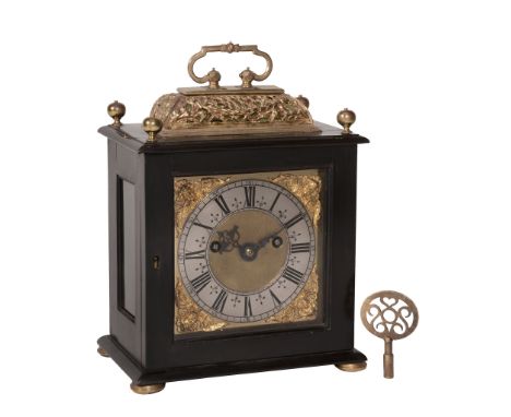 A fine Charles II gilt brass mounted ebony small basket top table clock with pull-quarter repeat Charles Gretton, London, cir