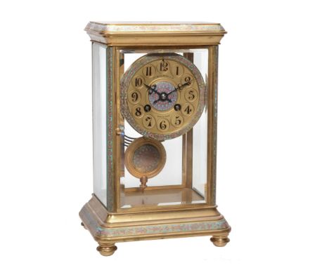 A French champleve enamelled gilt brass four-glass mantel clock Retailed by...  A French champleve enamelled gilt brass four-