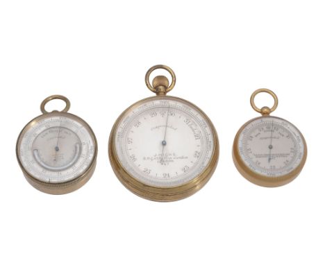 A Victorian gilt brass cased aneroid pocket barometer with altimeter scale...  A Victorian gilt brass cased aneroid pocket ba