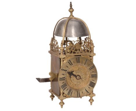 A brass miniature lantern timepiece with alarm Unsigned late 17th century...  A brass miniature lantern timepiece with alarm 
