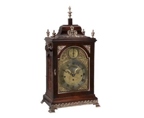 A fine George III brass mounted figured mahogany quarter chiming table clock...  A fine George III brass mounted figured maho