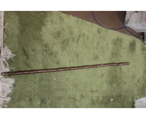 A VINTAGE SCOUT STAFF WITH BEAU DESERT BADGES